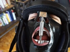 Medical braces and strange masks in a hot BDSM prono
