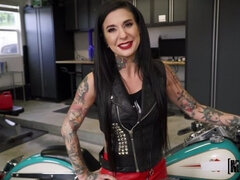 Seducing tattooed experienced lady Joanna Angel giving an amazing footjob