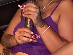 EBONY MODEL WITH FULL TATTOOS PLAYS WITH HER IN THE CAR