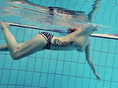 Katrin with big tits bounces and swims underwater