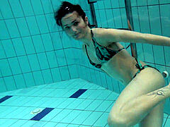 shaved tight ultra-cutie Markova in the Czech pool