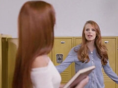 Lesbian redheads are enjoying hot loving in a classroom