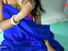 Sexy Indian bhabi in a blue saree gets her hairy pussy fucked in a steamy homemade video