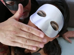 A explicit broad is fucked by a guy that has a mask on