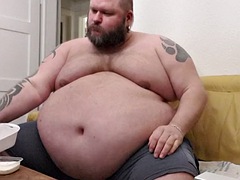 Superchubby SOC - fat guy eating a big burger and onion rings