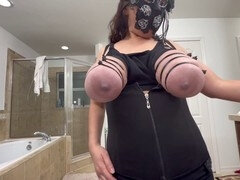 Bound natural breasts milked with a goat pump