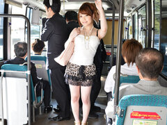 Lucky stranger gets a handjob from Japanese girl in the bus