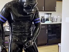 Rubberdrone jerks off in latex socks