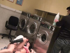 Naughty Ava Dalush sucks, fucks, and moans in front of a crowd of strangers in the local laundry