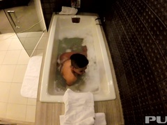 Jezebelle Bond films herself taking a bath