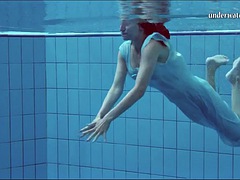 Teen with big natural tits Piyavka Chehova swimming naked