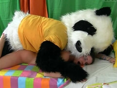 Hot woman is getting fucked by a guy that is in a panda costume