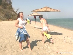 Three teens skinny dipping in the ocean