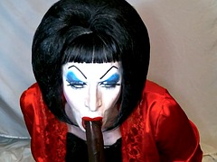 Heavy makeup slut Debra pleases daddy by sucking a BBC dildo