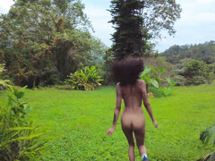 Spicy ebony girl poses naked and masturbates outside
