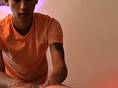 Young Latino Alfonso Gutierrez massages Jason before facial