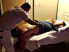 A rugby player gets hard during his massage