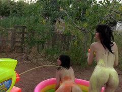 Liz Rainbow and Nerea Falco lesbian sex in the inflatable pool