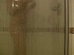 Sexy chick with big boobs filmed in the shower by bf