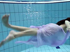 Dark haired Aneta in the pool