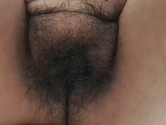 Mature milf records her pussy from below