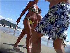 breath-taking young teenage with a small bathing suit thong !