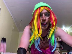Rainbow sissy Natasha eats cum