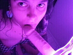 Neon lights, sucking dildo, tattooed girl