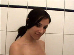 Golden Shower - buxom gal takes piss and spunk on her chest