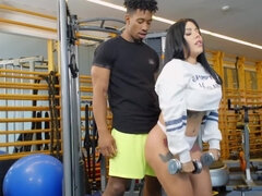 Thick Latina bangs black fitness instructor in a gym