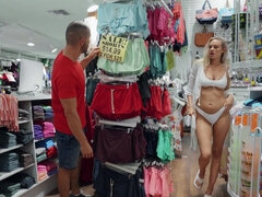 Blonde Addie Andrews gives a blowjob and has sex in a clothing store