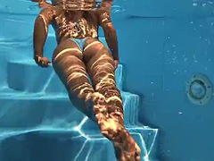 Sophie Otis takes a sexy dip in the pool