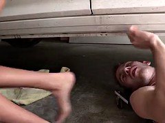 Daring sister blows off her older brother's dick in the garage