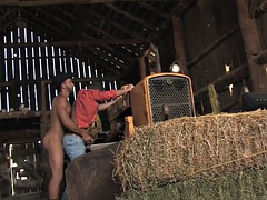Cowboy with a big dick in a hat fists hay hard in the stable
