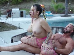 Outdoor sex tape with piercings and fun by the pool