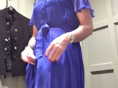 Sissygasm in blue satin dress