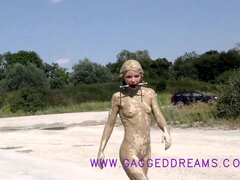 mud decorated beauty ambling in a stone quarry