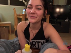 Karly licks the cum off of her hand