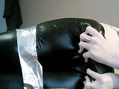 tape tied & gagged in leather stretch pants