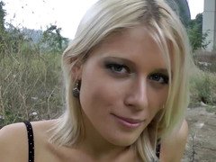 Blonde with blue eyes places her hands on a fuck tool and she sucks it
