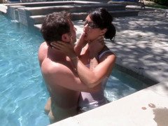 A gal kisses her lover in the pool and furthermore she makes him cum