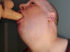 Rotating dildo with deep throat