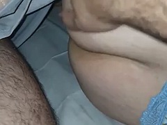 Stepmom is naked in bed and gets her white ass massaged by her stepson with a small cock