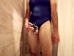 Jerking off in a swimsuit in the shower