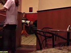 Tall guy sneak analyzes tiny redhead right in the cafe