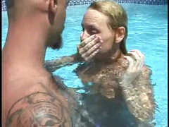 big-titted ash-blonde fellatio underwater topless while holding breath