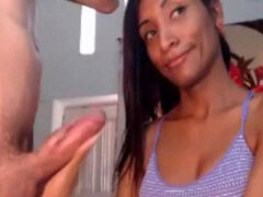 ebony colombian she-creature providing handjob