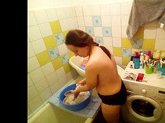 Spying caught like a naked mommy washing clothes - MyNakedStepmother