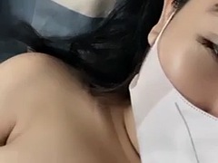 Beauty with big tits masturbates with a bottle because she is very horny
