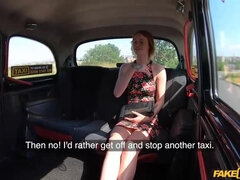 Ginger girl with blue eyes is providing a oral to a jaw-dropping cab driver, just for joy